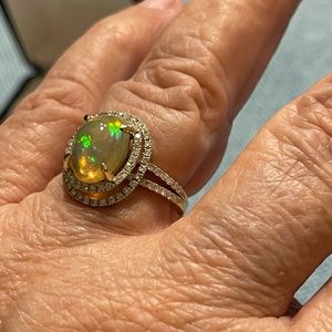 Ethiopian Opal Ring 14K yellow gold with .77 tcw white diamonds